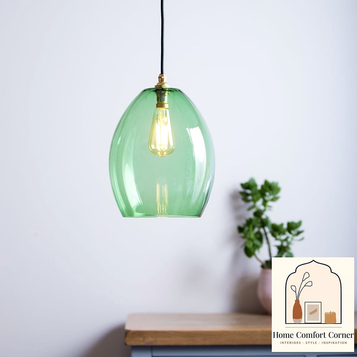 25 Green Room Decor Looks We're Obsessed With This Year 20 Green Glass Pendant Lighting