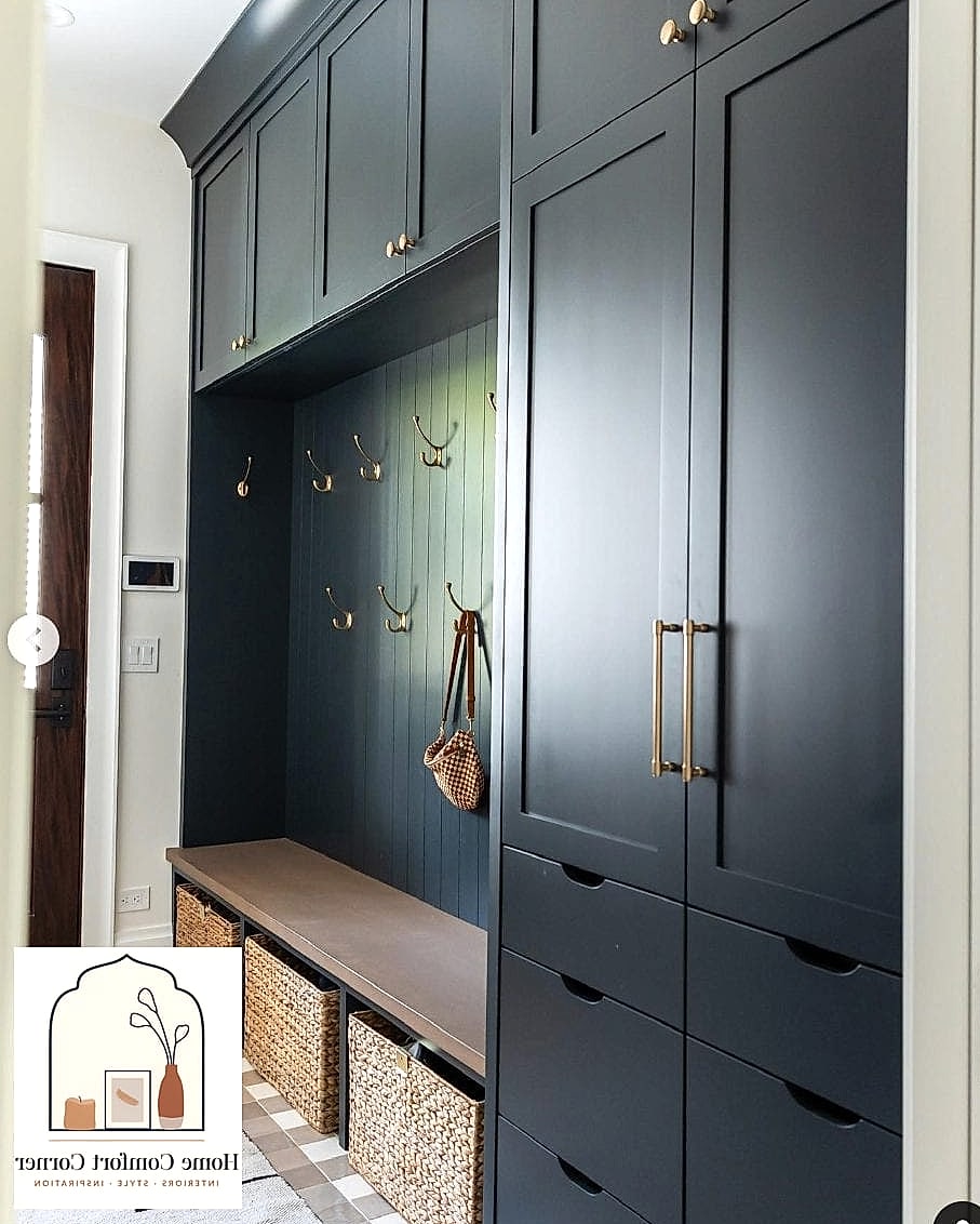 A Mudroom Bench With Mismatched Vintage Hooks